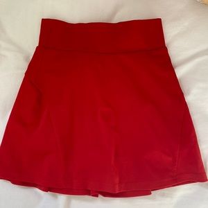 red high waisted pleated tennis skirt